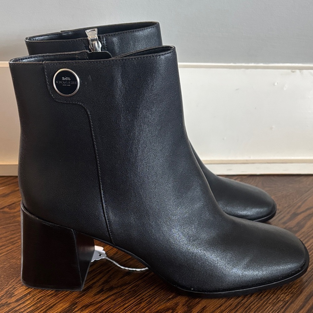 Coach black heeled ankle boots with silver and black logo 9.5